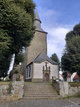 Pfarrkirche St. Johannes Baptist mit Turm und der davorliegenden Marienkapelle. In der Marienkapelle befindet sich die Madonna „Maria vom Stein“