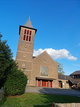 Das zweischiffige Kirchengebäude mit dem überragenden fünfgeschossigen Turm ist auch heute noch Mittelpunkt im kirchlichen und gesellschaftlichen Leben des Gemeindeteils Viersen-Hamm.